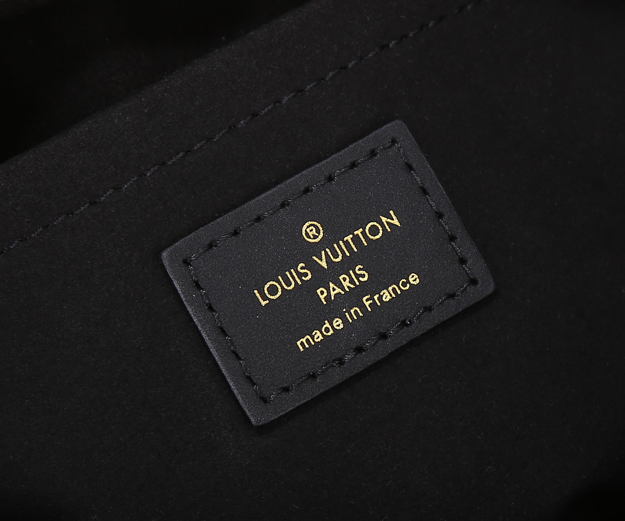 Onthego East West Chain Monogram Empreinte Leather Black M23640