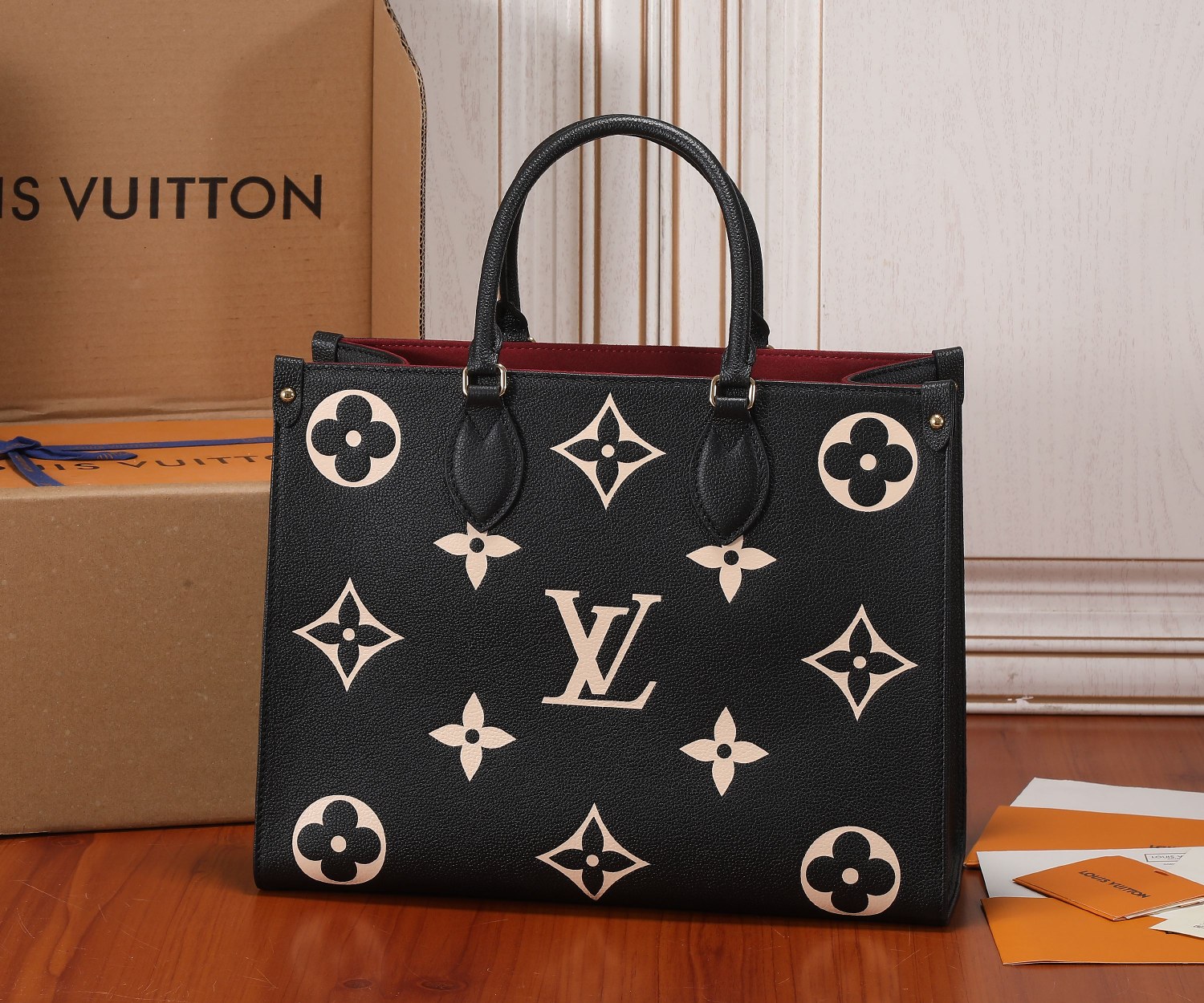 Onthego Mm Bicolor Monogram Empreinte Leather Black/Beige M45495