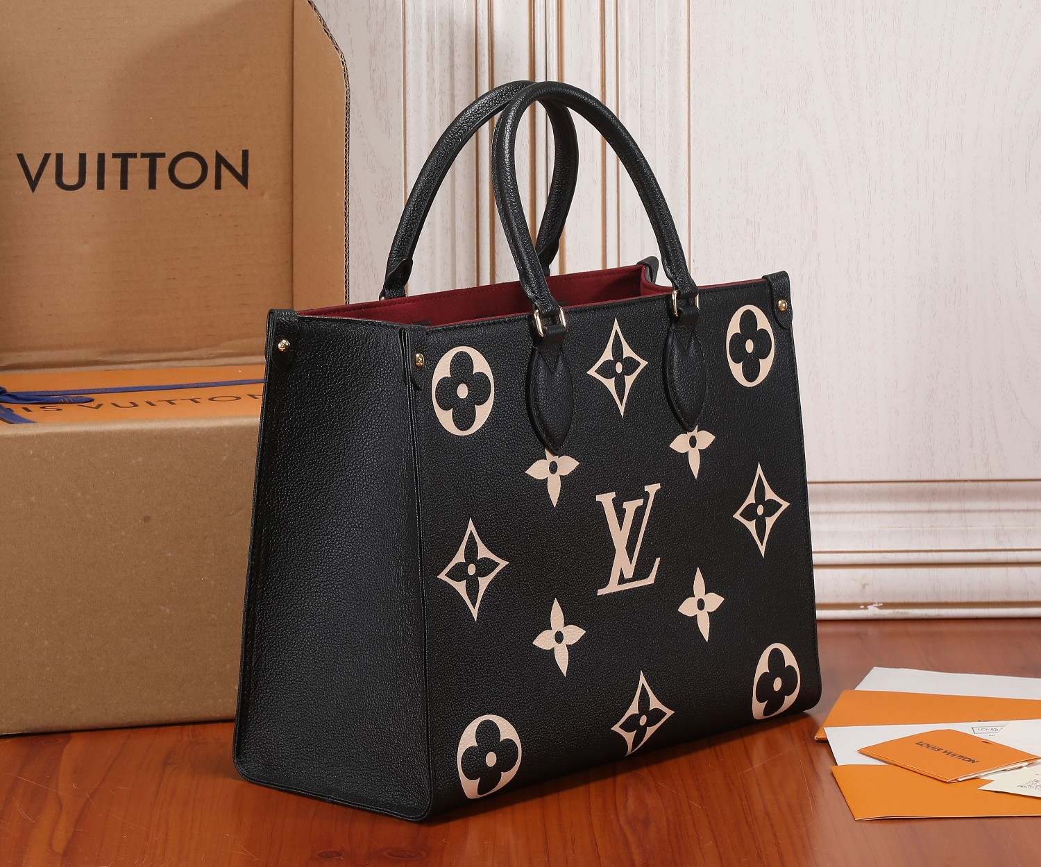 Onthego Mm Bicolor Monogram Empreinte Leather Black/Beige M45495