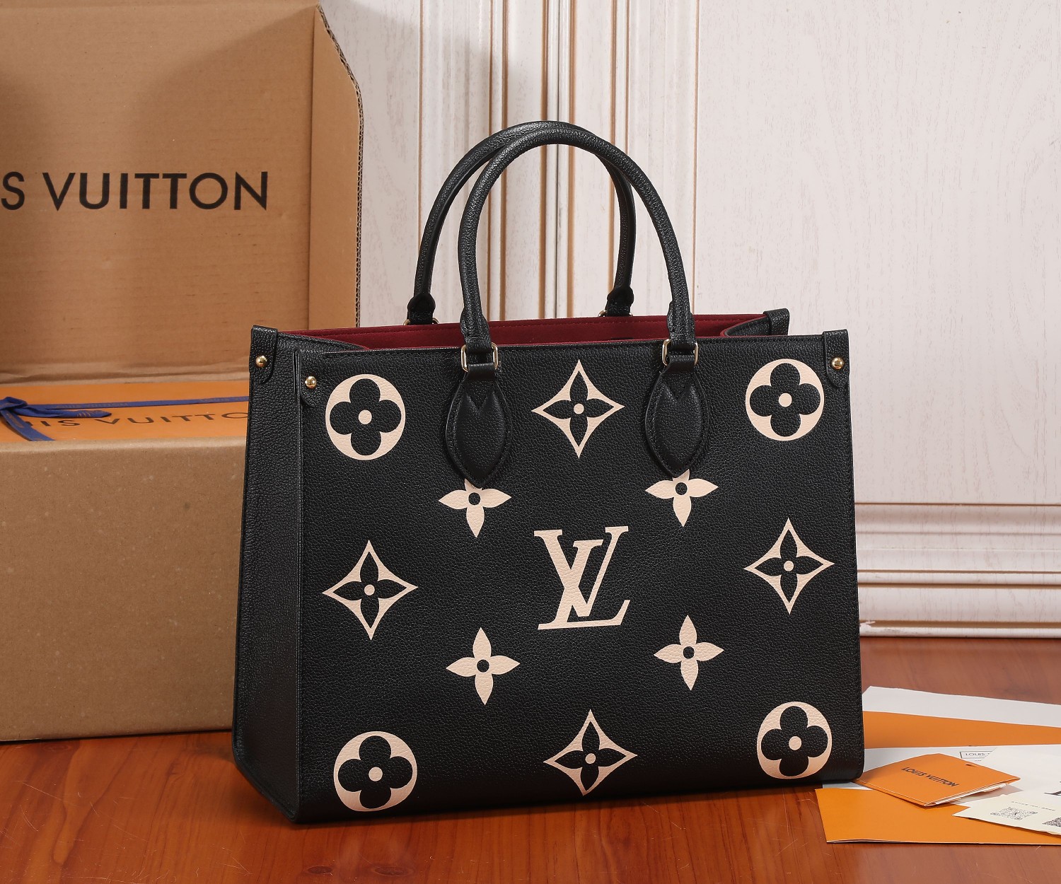 Onthego Mm Bicolor Monogram Empreinte Leather Black/Beige M45495