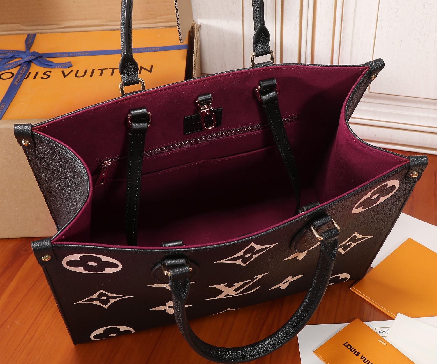 Onthego Mm Bicolor Monogram Empreinte Leather Black/Beige M45495