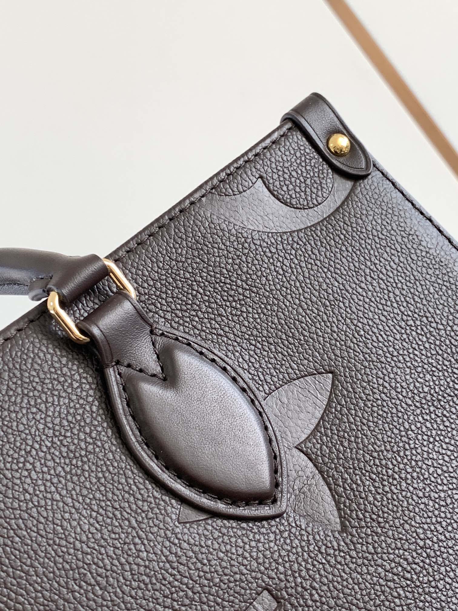 Onthego Mm Monogram Empreinte Leather Chocolate M12967
