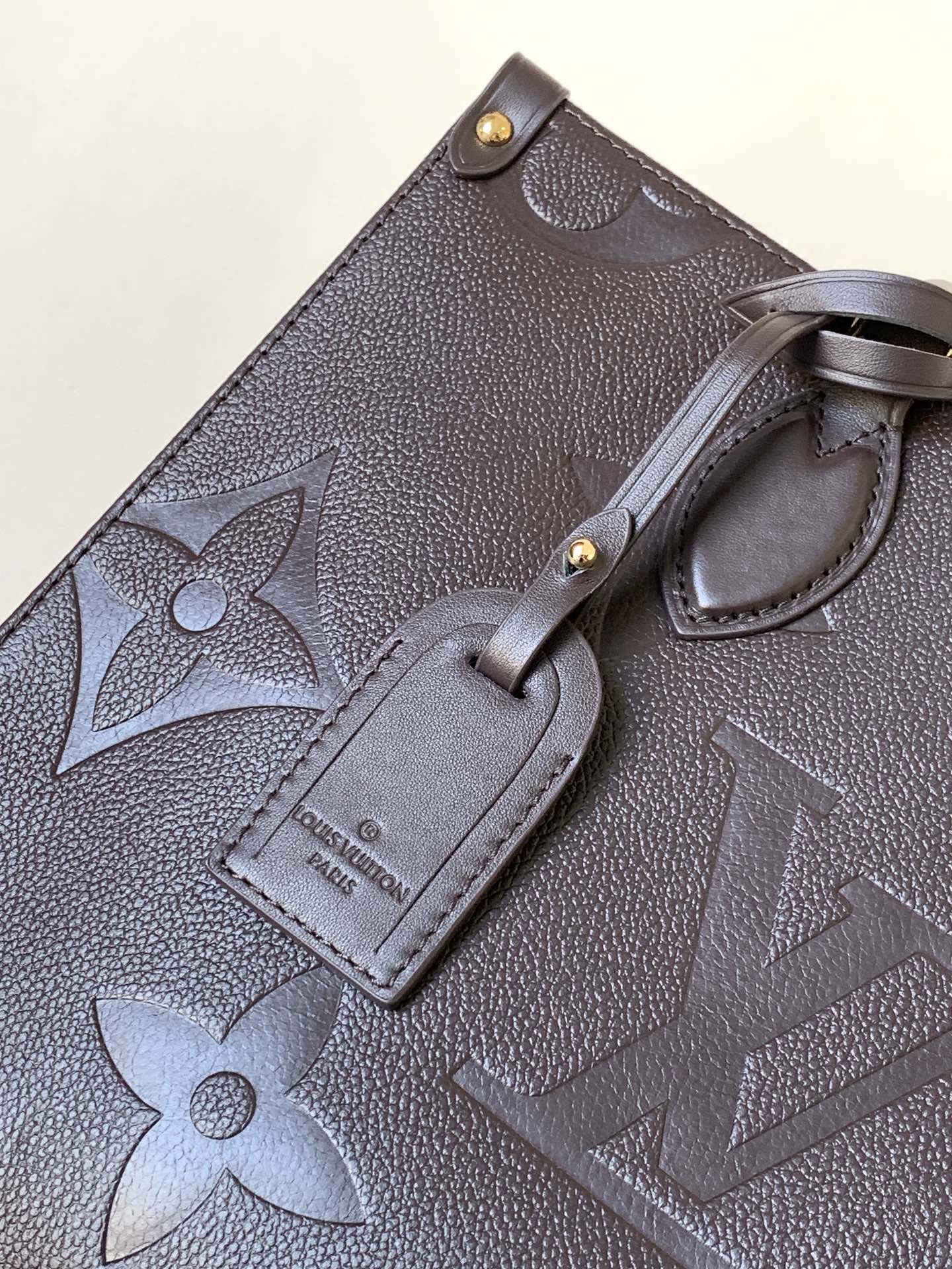 Onthego Mm Monogram Empreinte Leather Chocolate M12967