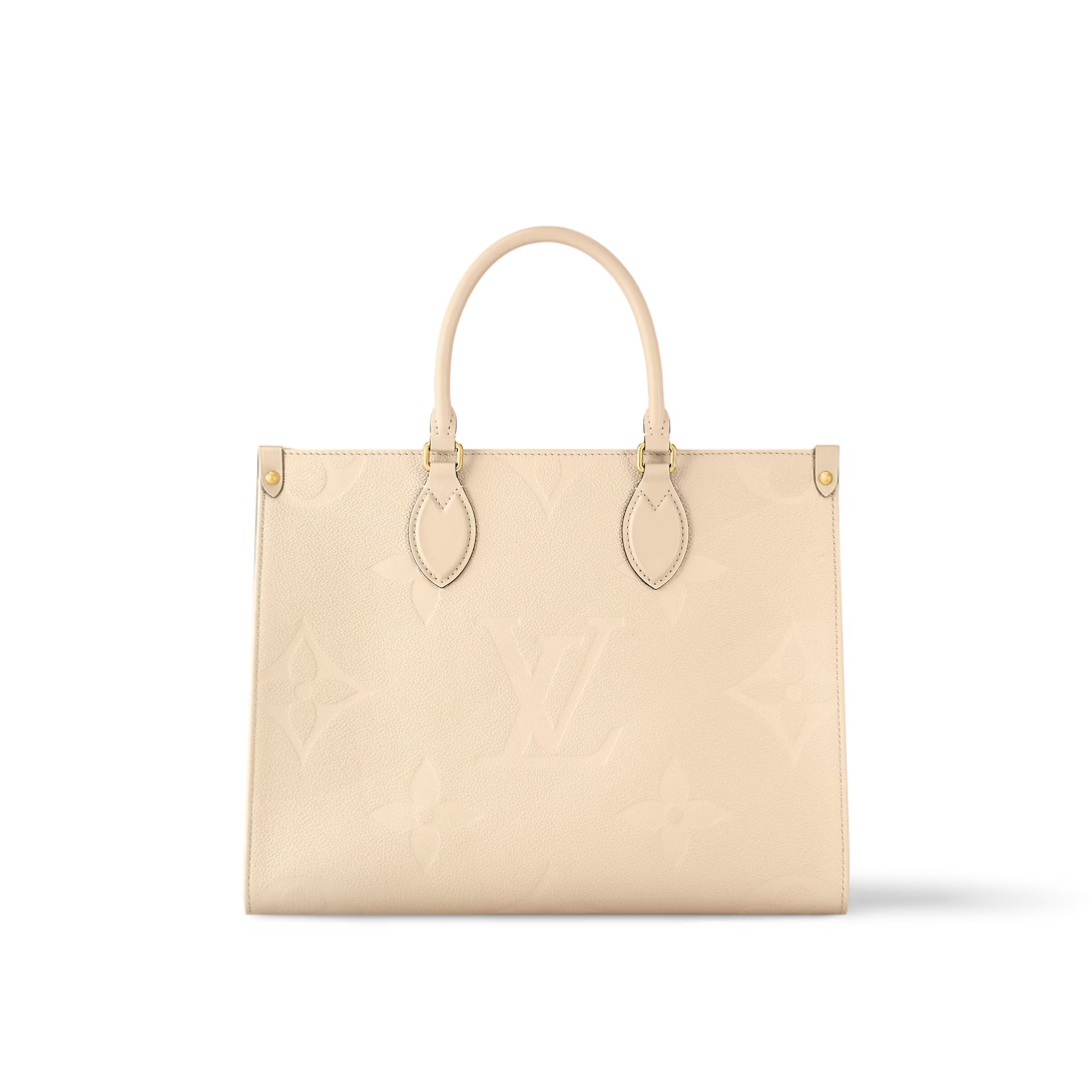 Onthego Mm Monogram Empreinte Leather Cream M46531