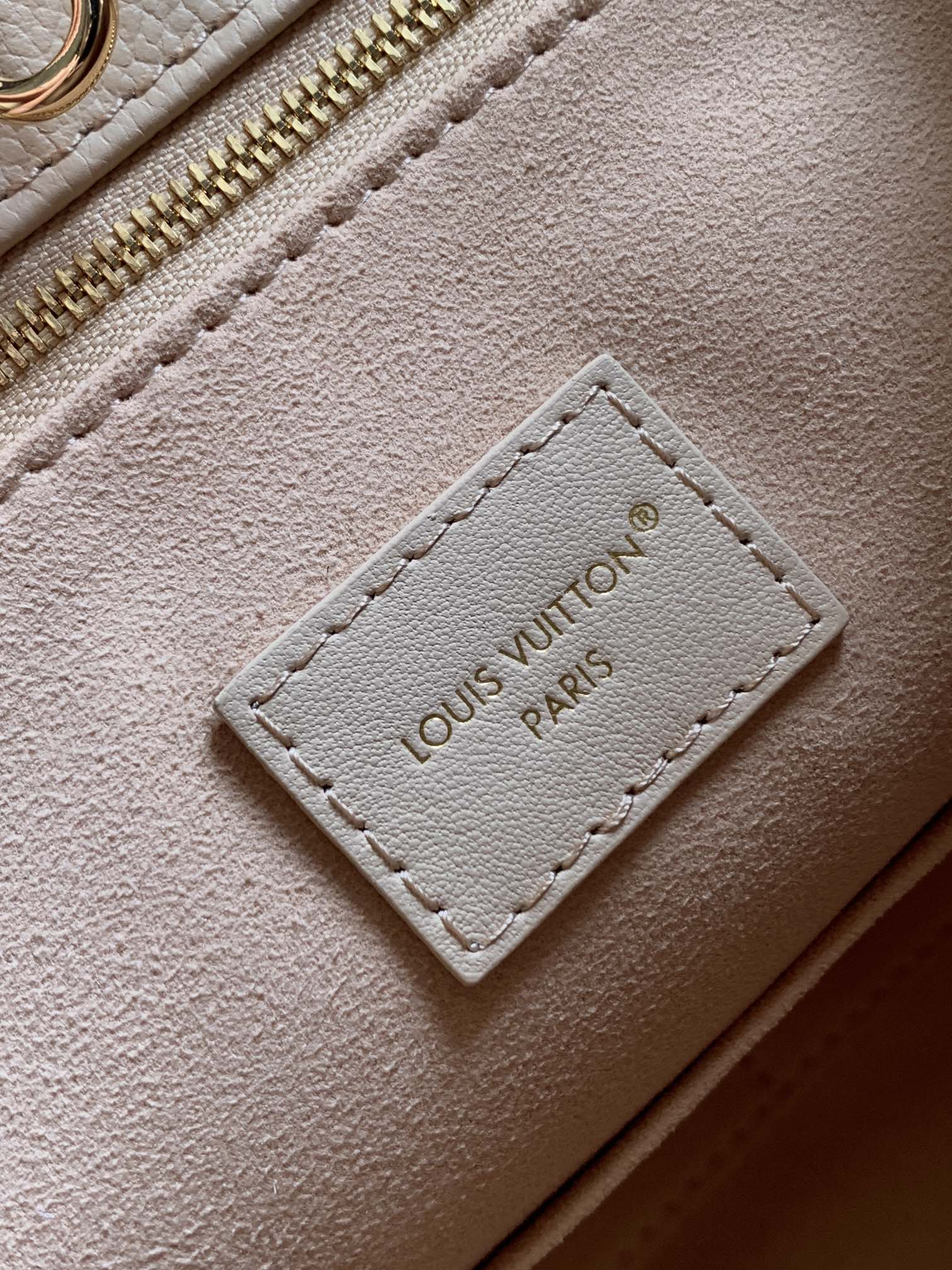 Onthego Mm Monogram Empreinte Leather Sand M14255