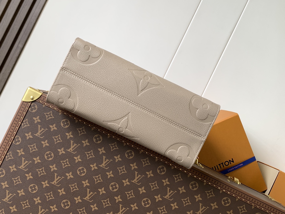 Onthego Mm Monogram Empreinte Leather Tourterelle Beige M45607