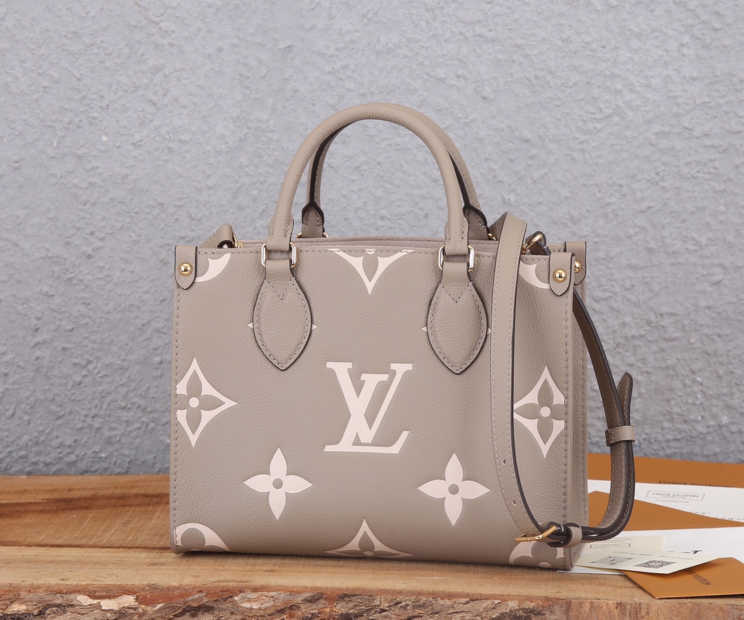 Onthego Pm Bicolor Monogram Empreinte Leather Dove/Cream M45779
