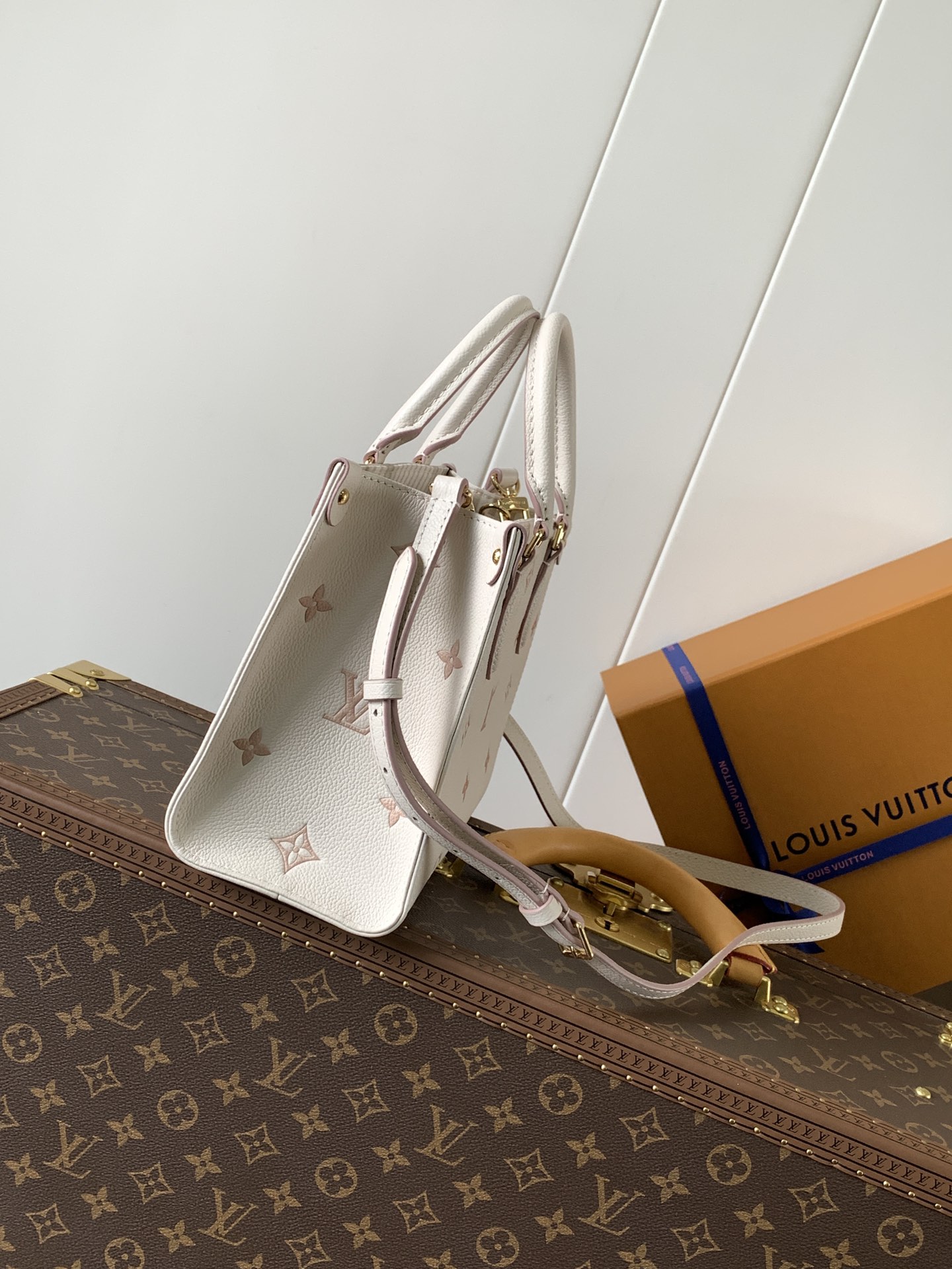 Onthego Pm Monogram Empreinte Leather Eden Tote M14403