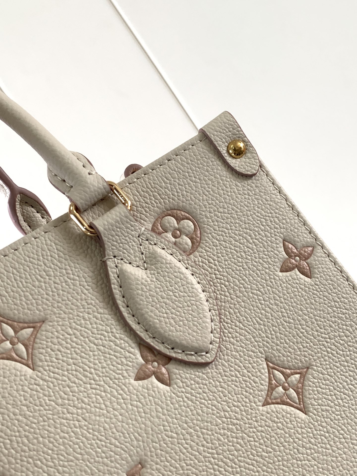Onthego Pm Monogram Empreinte Leather Eden Tote M14403