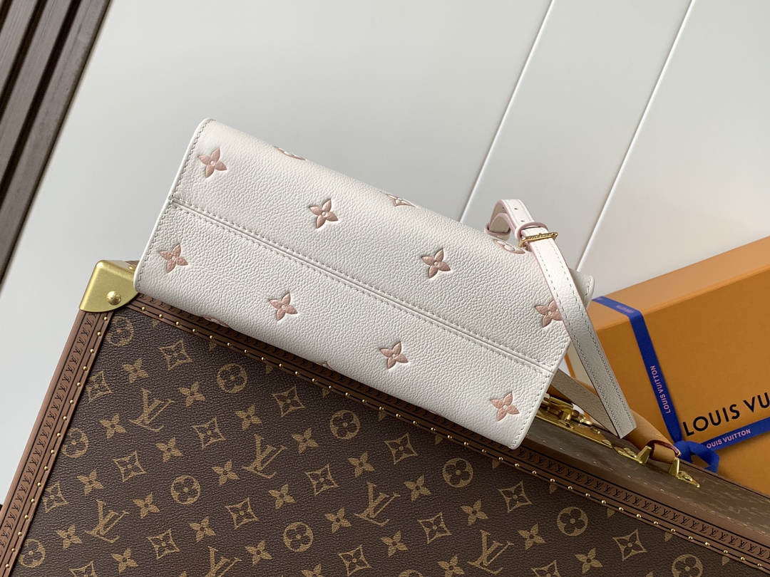 Onthego Pm Monogram Empreinte Leather Eden Tote M14403