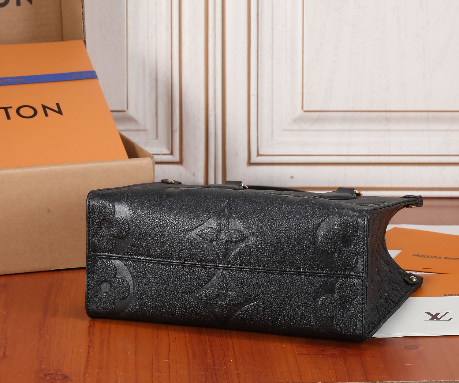 Onthego Pm Monogram Empreinte Leather Tote Black M45653