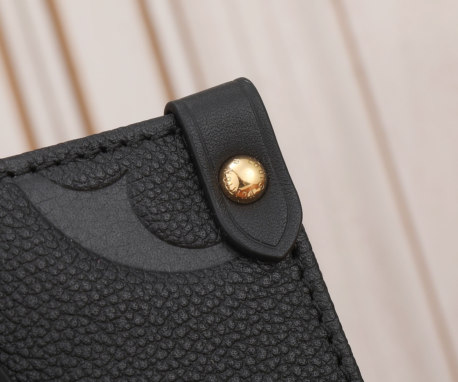 Onthego Pm Monogram Empreinte Leather Tote Black M45653