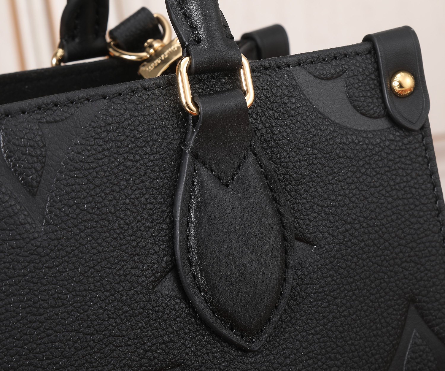 Onthego Pm Monogram Empreinte Leather Tote Black M45653