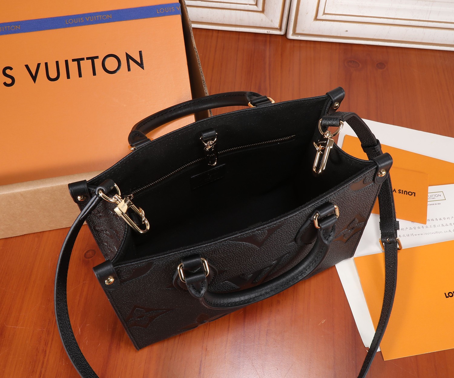Onthego Pm Monogram Empreinte Leather Tote Black M45653