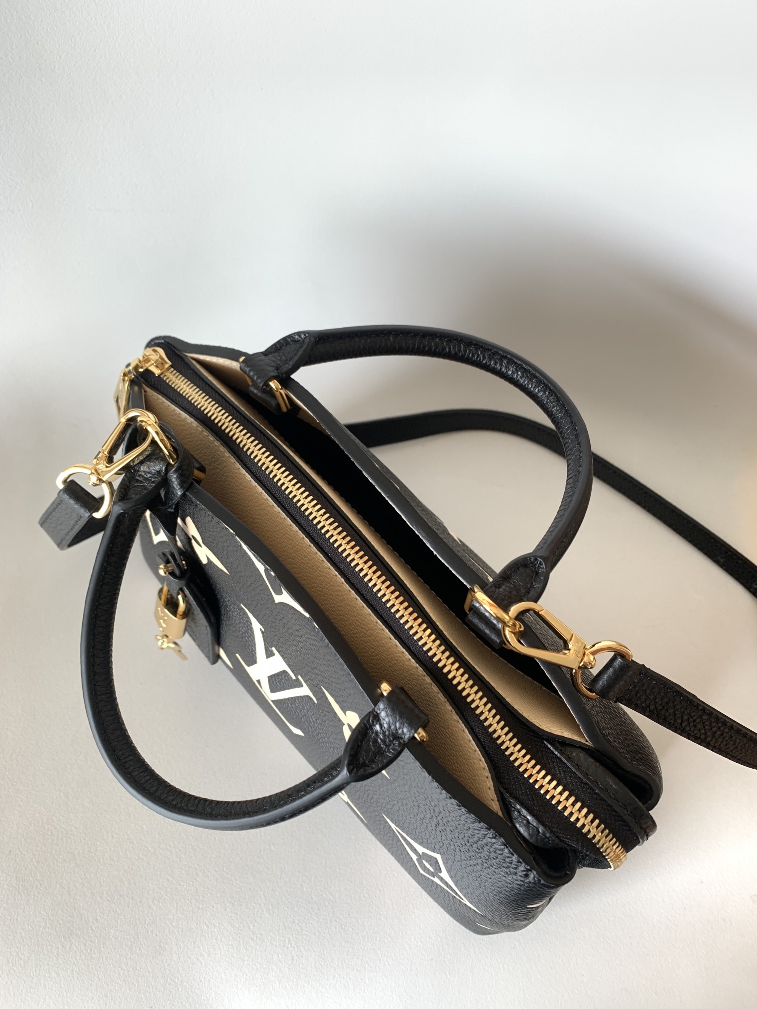 Petit Palais Handbags Bicolor Monogram Empreinte Leather Black/Beige M58913