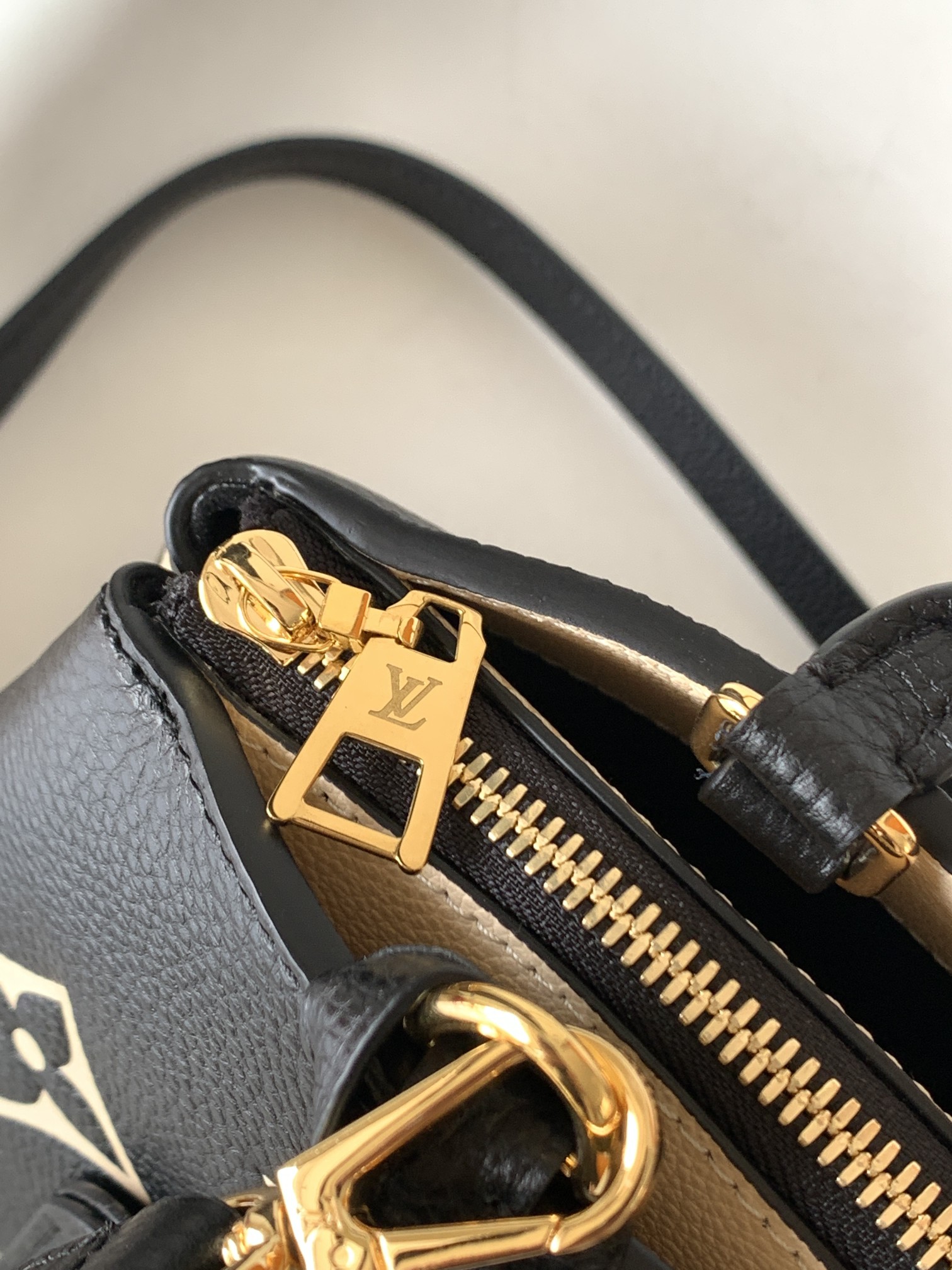 Petit Palais Handbags Bicolor Monogram Empreinte Leather Black/Beige M58913