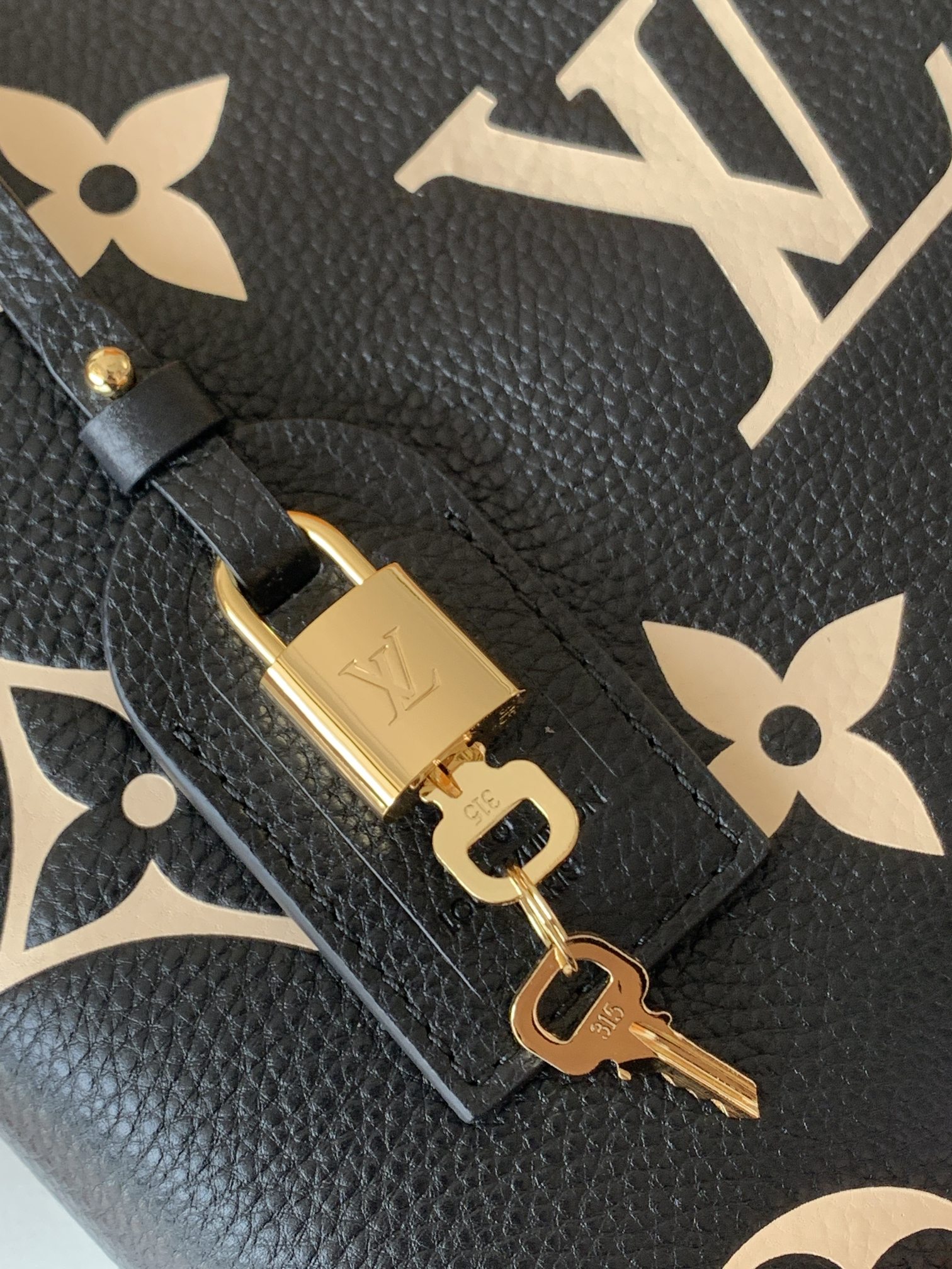 Petit Palais Handbags Bicolor Monogram Empreinte Leather Black/Beige M58913