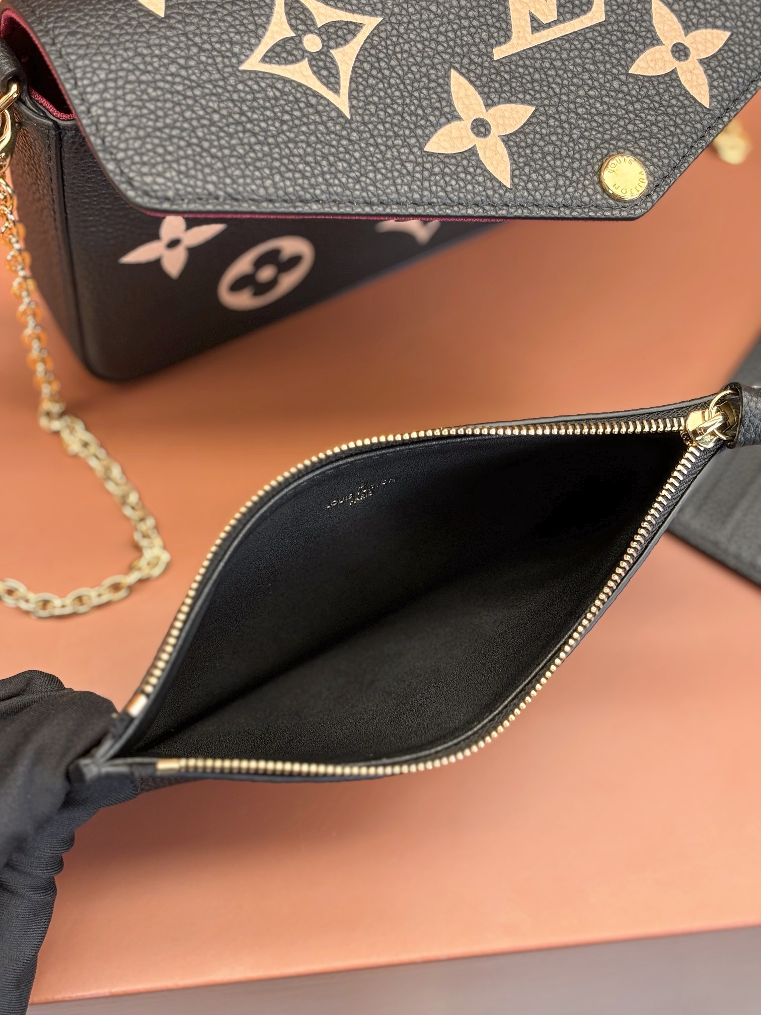 Pochette Félicie Bicolor Monogram Empreinte Leather Black / Beige M82479