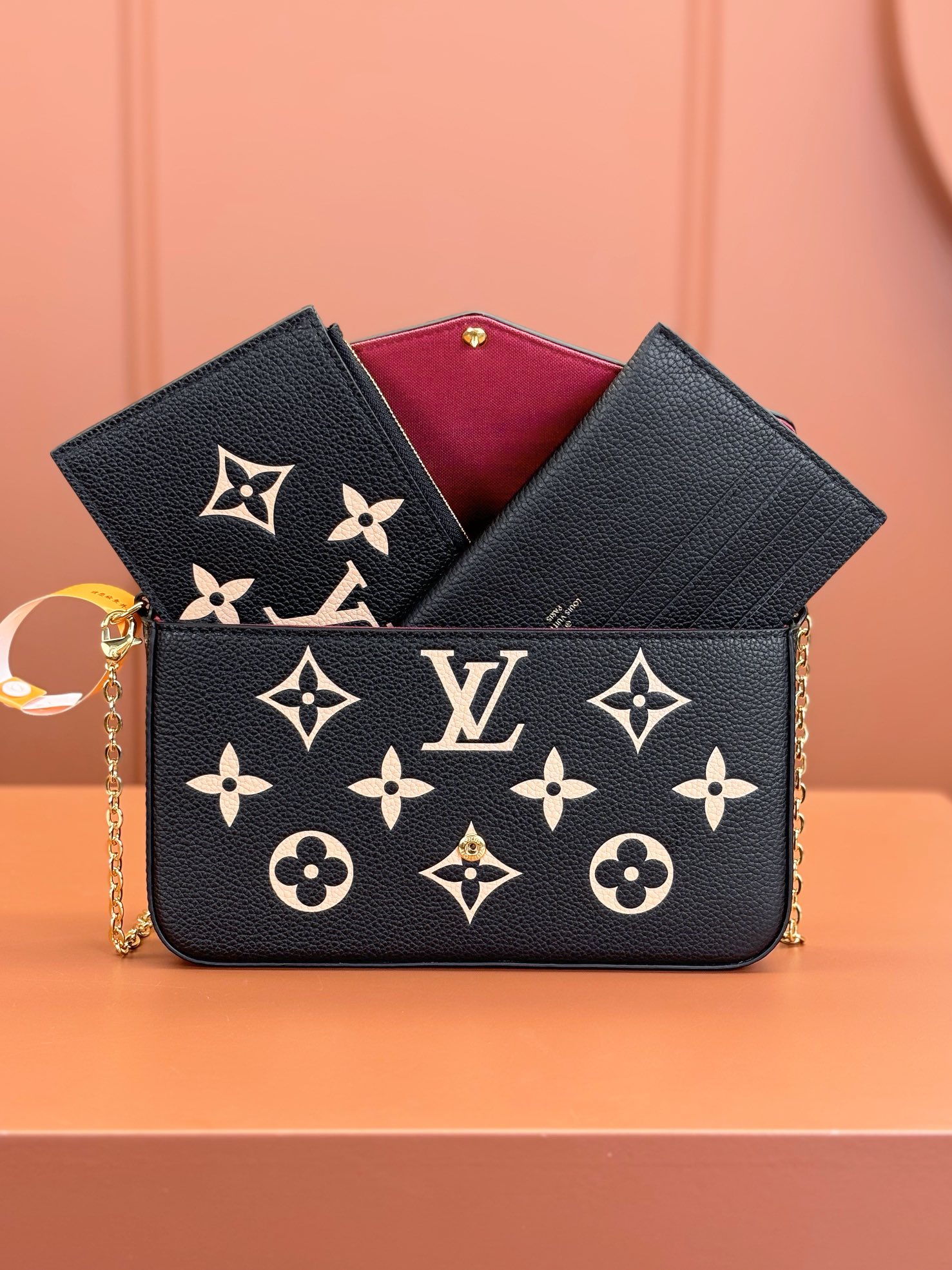 Pochette Félicie Bicolor Monogram Empreinte Leather Black / Beige M82479