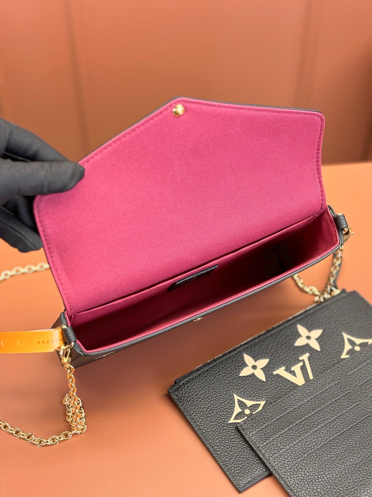 Pochette Félicie Bicolor Monogram Empreinte Leather Black / Beige M82479