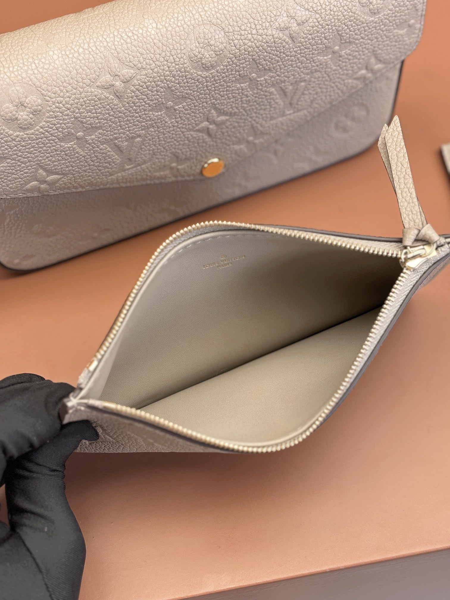 Pochette Félicie Monogram Empreinte Leather Turtledove M82609