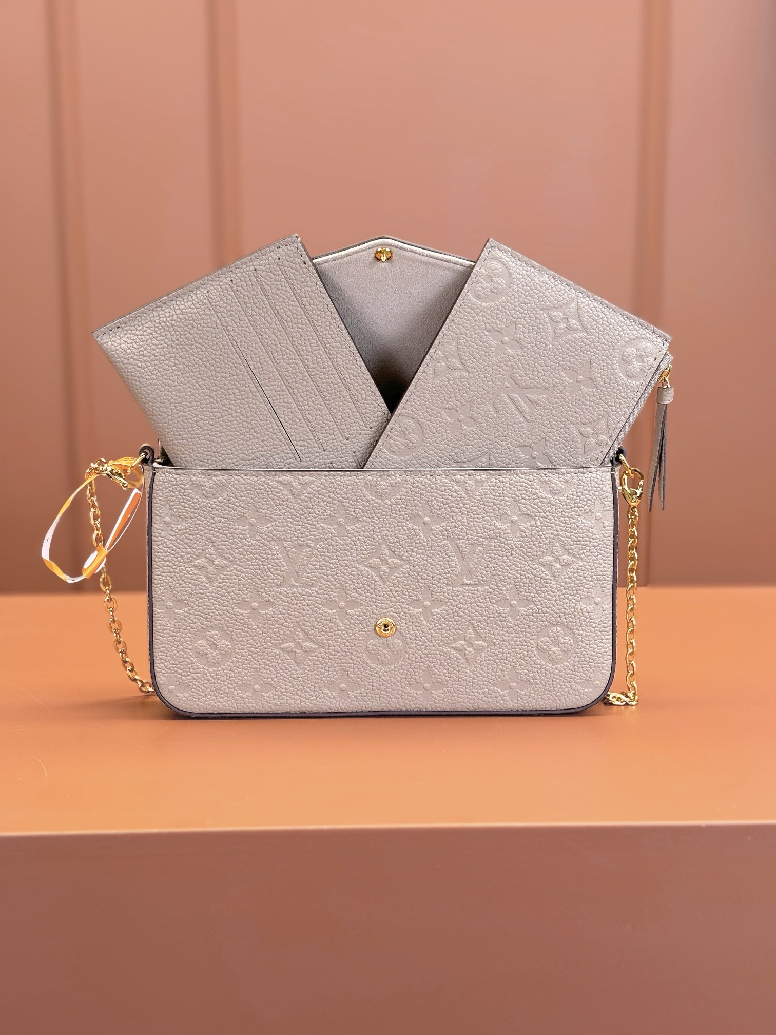 Pochette Félicie Monogram Empreinte Leather Turtledove M82609