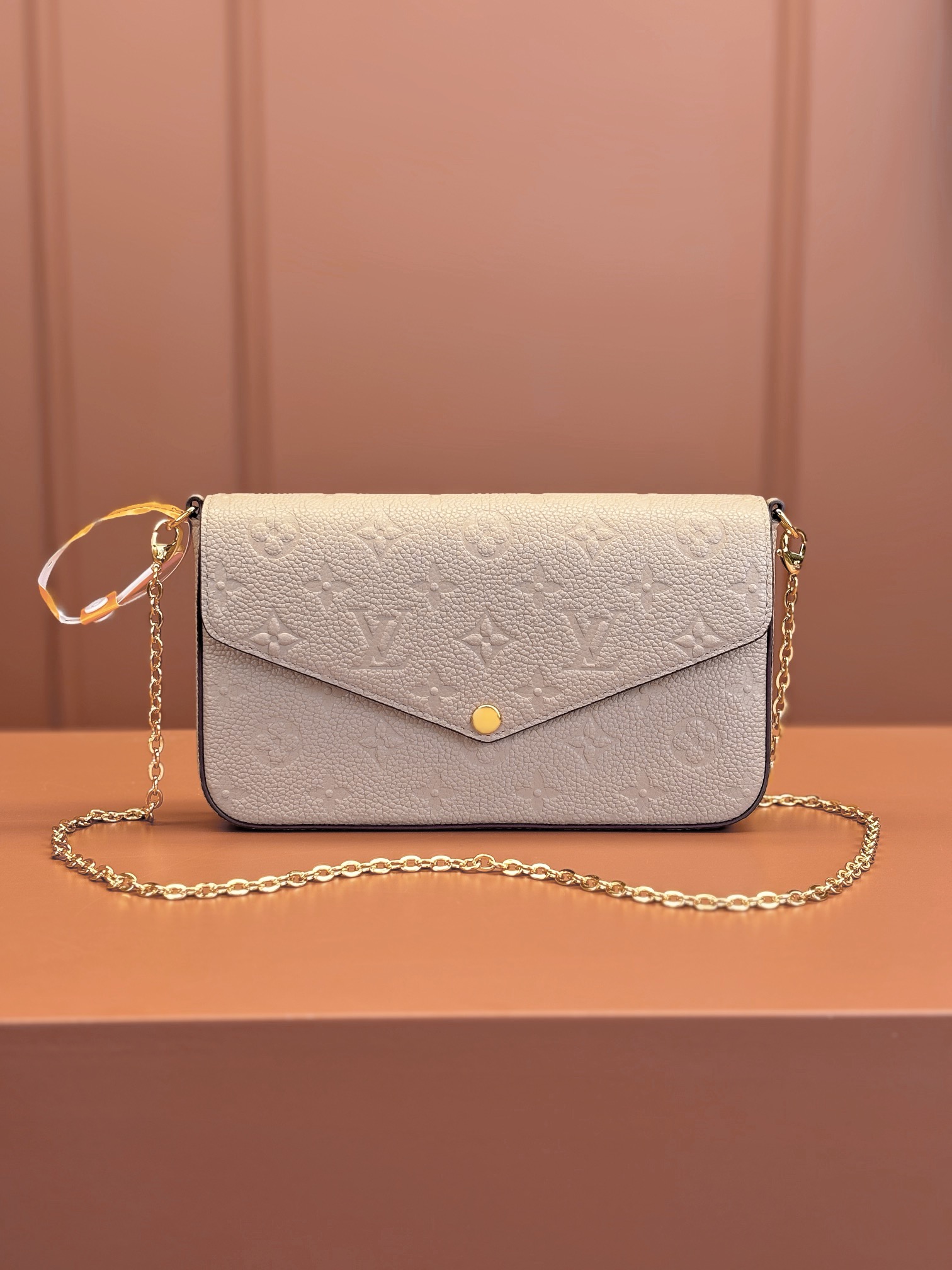 Pochette Félicie Monogram Empreinte Leather Turtledove M82609
