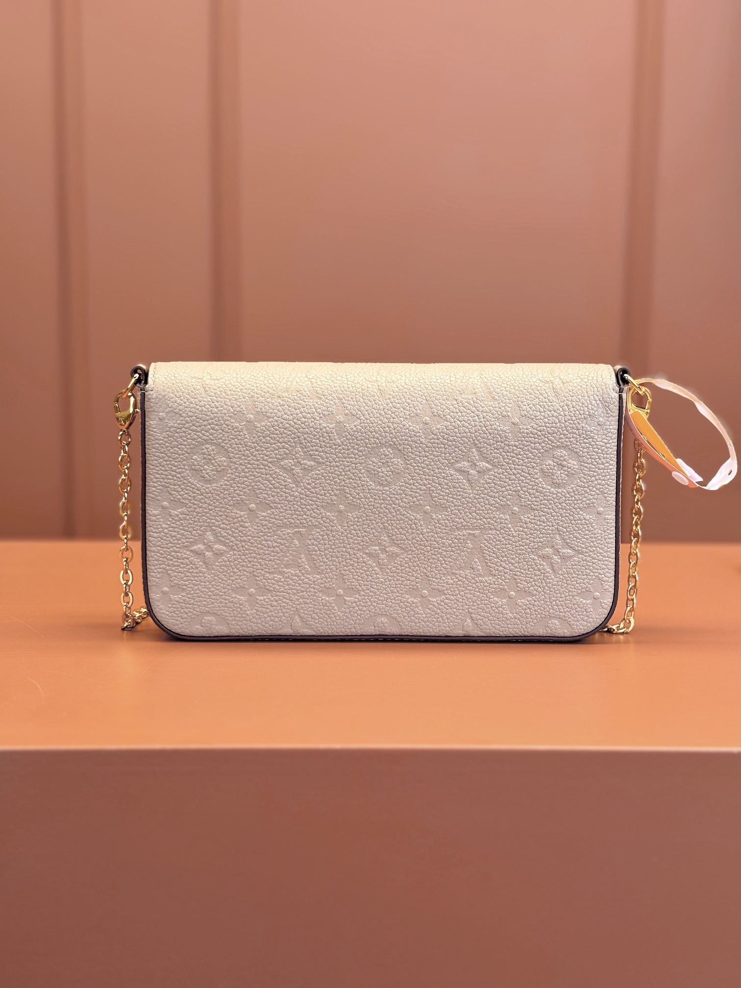 Pochette Félicie Monogram Empreinte Leather Turtledove M82609