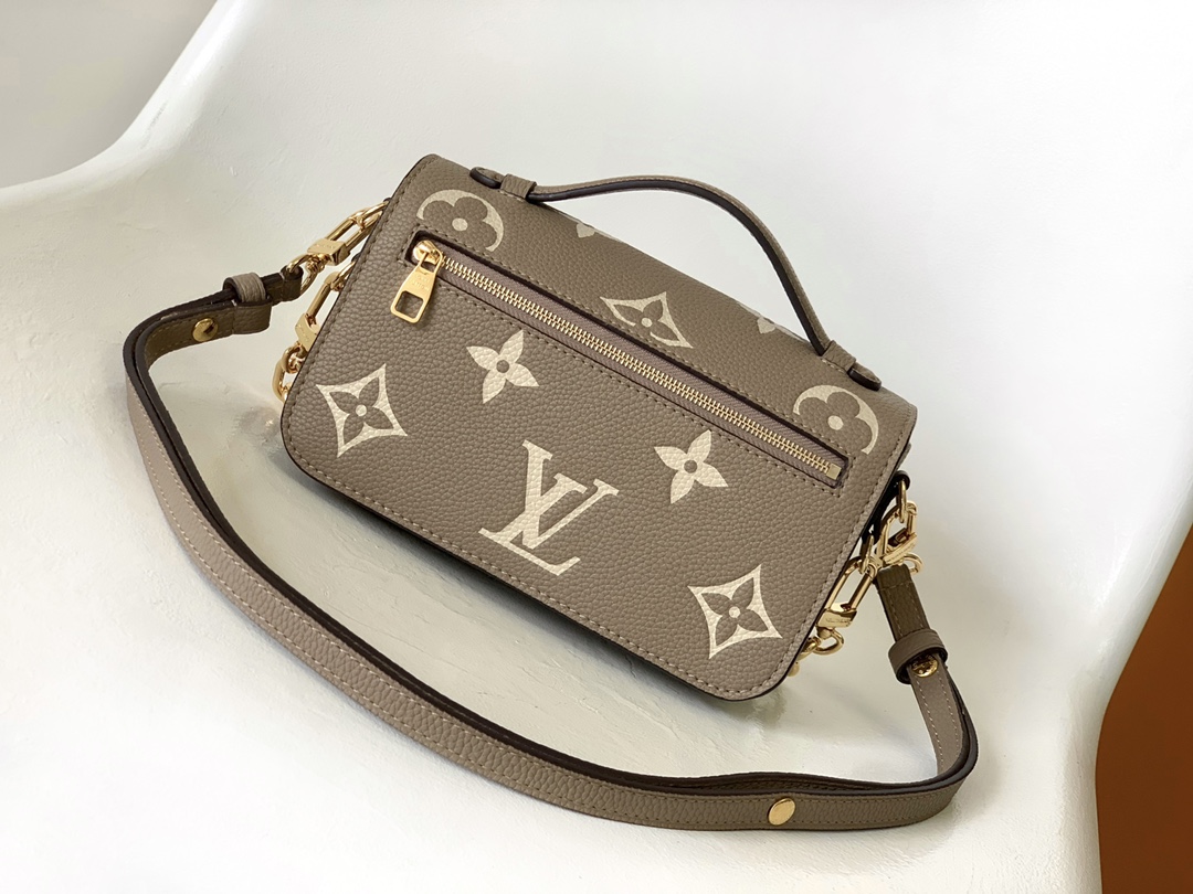 Pochette Métis East West Bag Bicolor Monogram Empreinte Leather Dove/Cream M23081