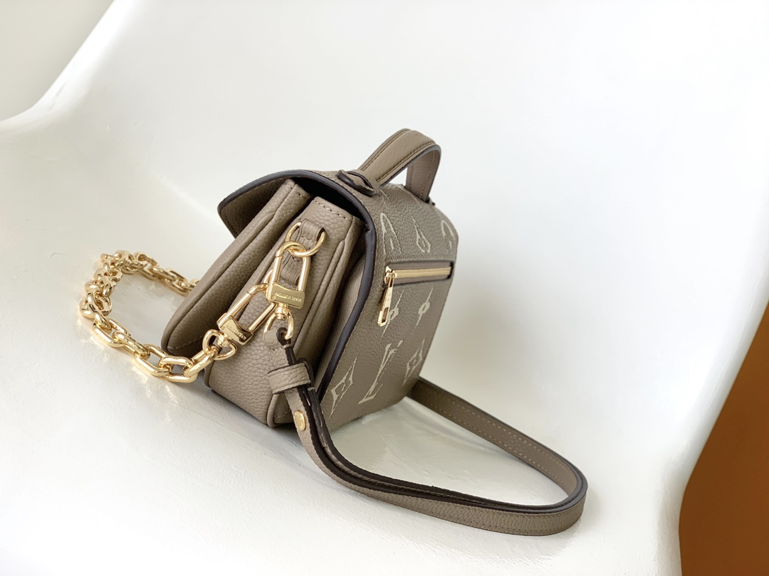 Pochette Métis East West Bag Bicolor Monogram Empreinte Leather Dove/Cream M23081