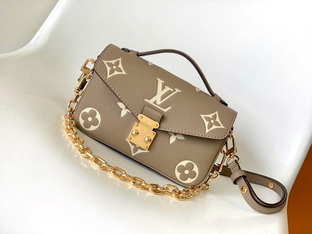 Pochette Métis East West Bag Bicolor Monogram Empreinte Leather Dove/Cream M23081