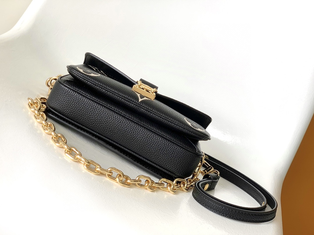 Pochette Métis East West Bag Bicolor Monogram Empreinte Leather Noir Beige M46596