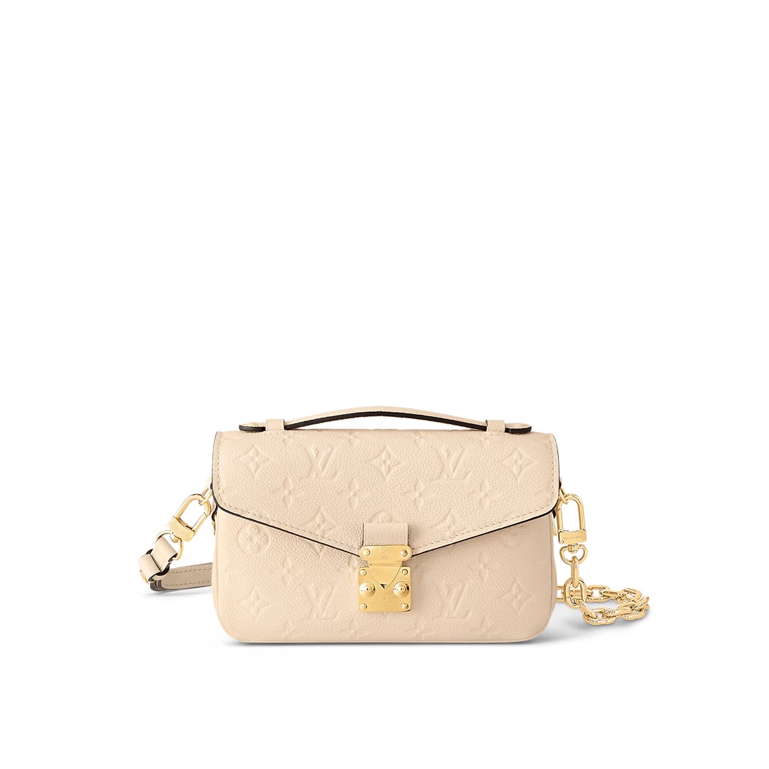 Pochette Métis East West Bag Monogram Empreinte Leather Cream M22942