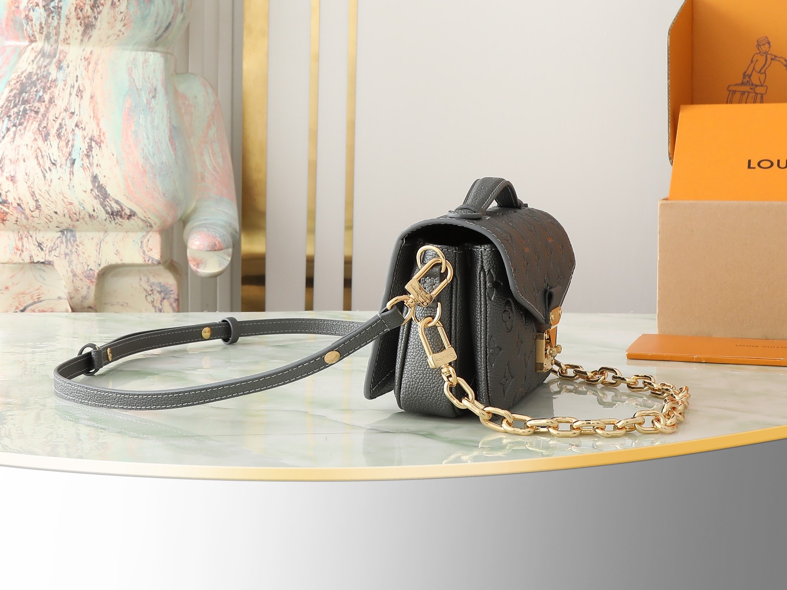 Pochette Métis East West Bag Monogram Empreinte Leather Gun Metal M11998