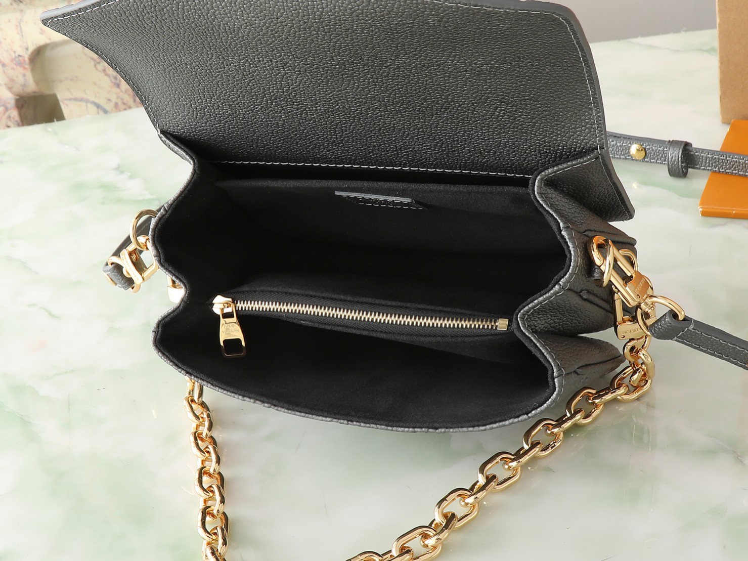 Pochette Métis East West Bag Monogram Empreinte Leather Gun Metal M11998