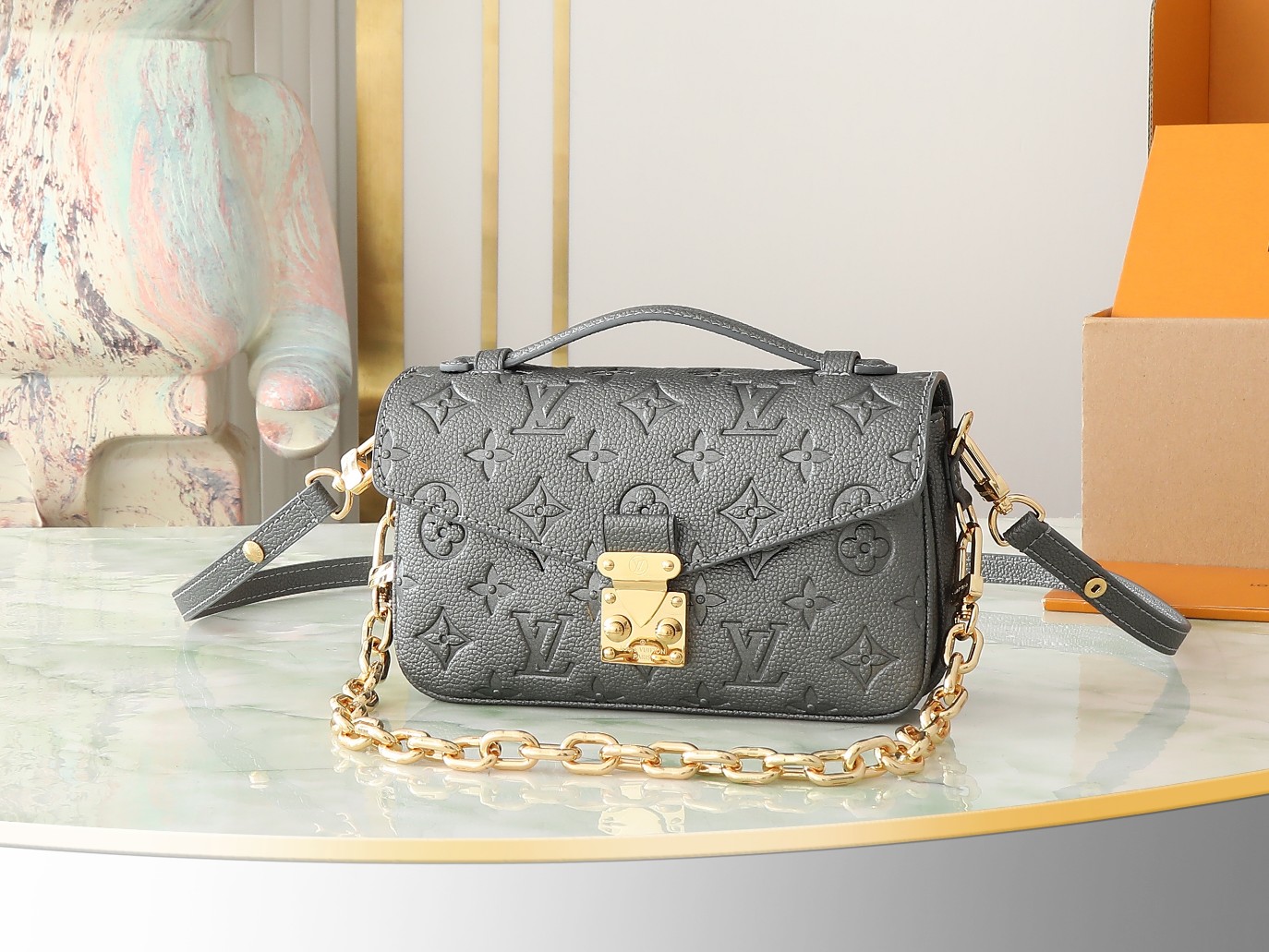 Pochette Métis East West Bag Monogram Empreinte Leather Gun Metal M11998