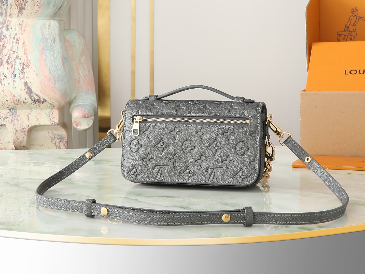 Pochette Métis East West Bag Monogram Empreinte Leather Gun Metal M11998