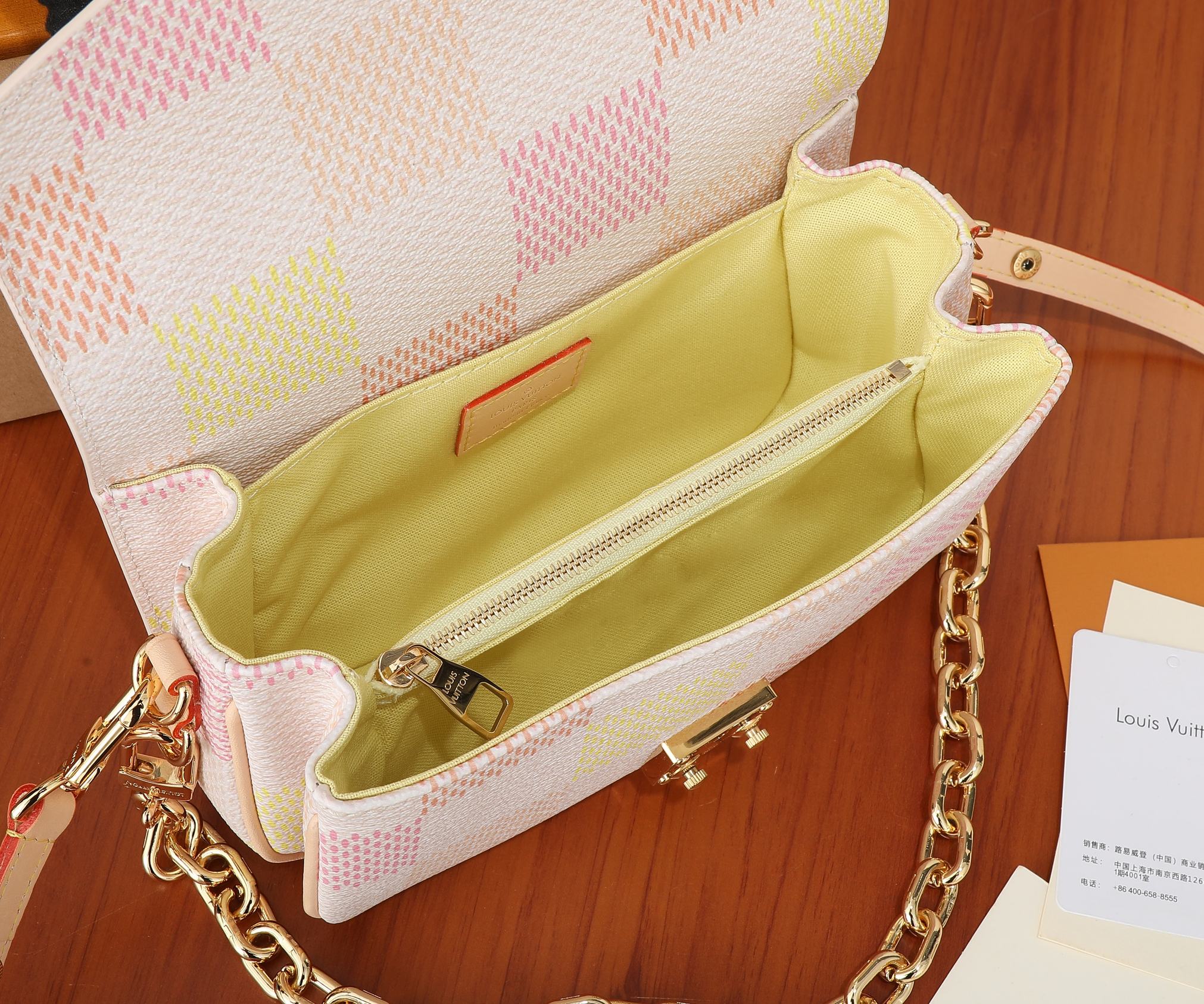 Pochette Métis East West Bag Peach Damier Giant Coated Canvas Bag N40749