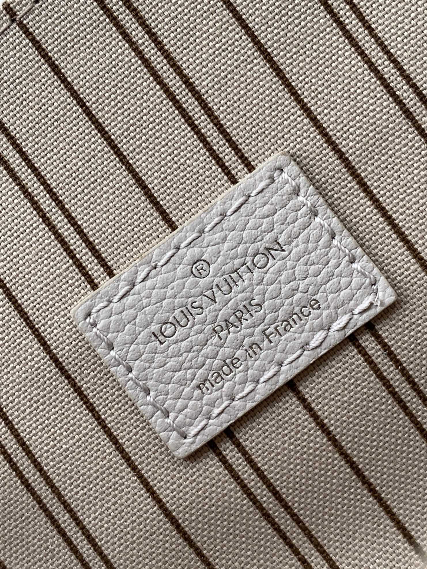 Pochette Métis Monogram Empreinte Leather Brume M13481