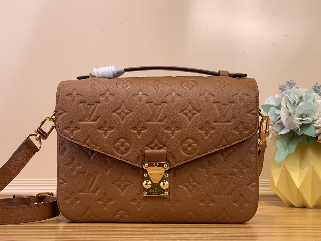 Pochette Métis Monogram Empreinte Leather Cognac M12711