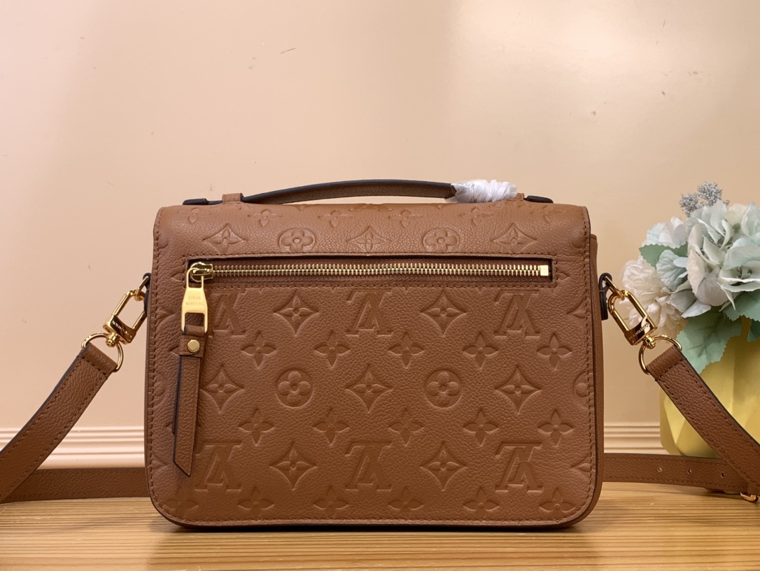 Pochette Métis Monogram Empreinte Leather Cognac M12711