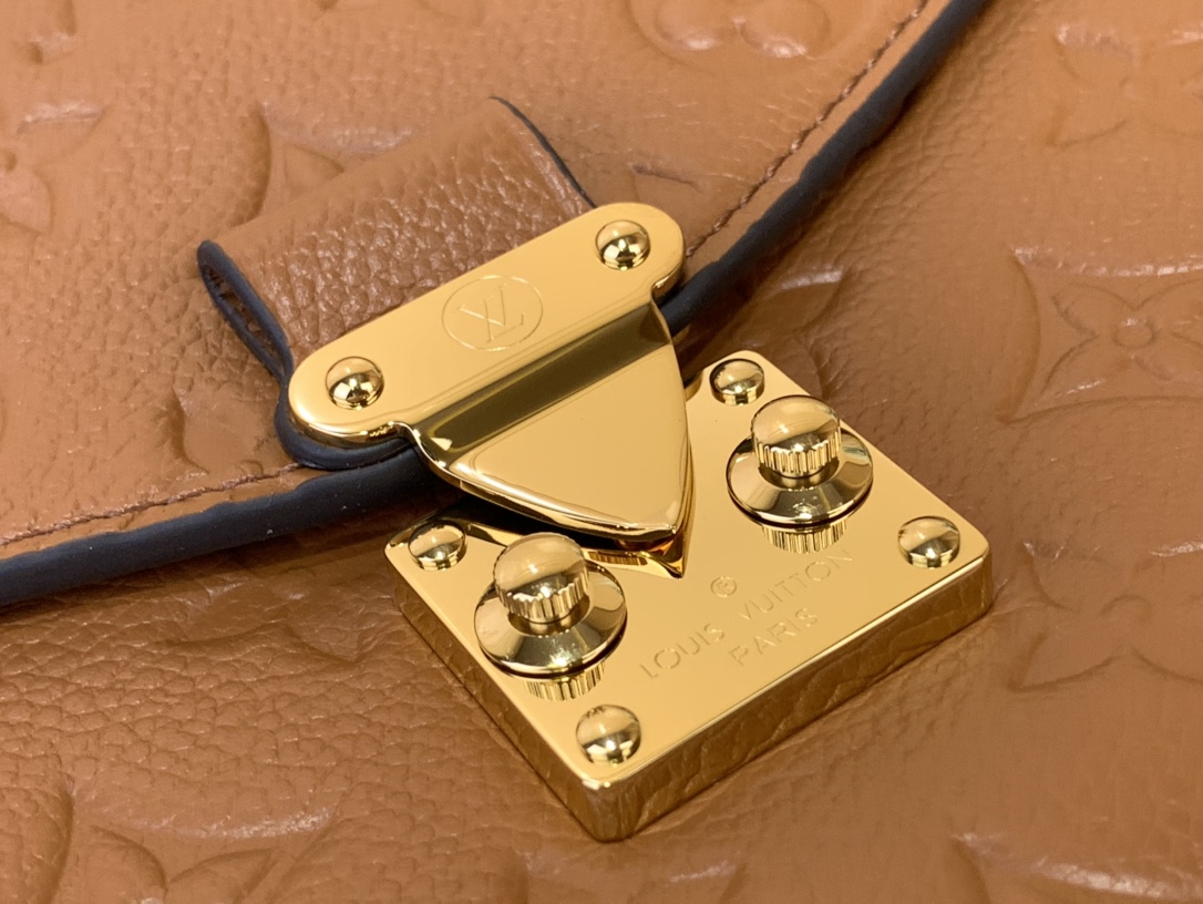 Pochette Métis Monogram Empreinte Leather Cognac M12711