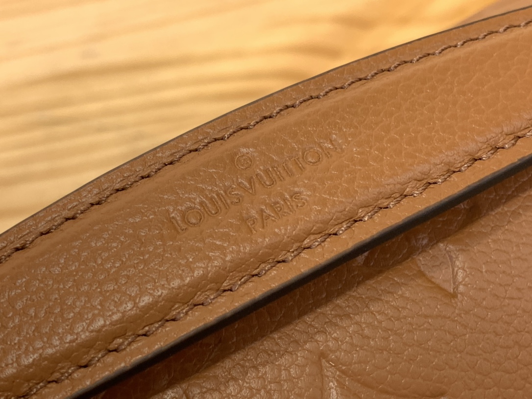 Pochette Métis Monogram Empreinte Leather Cognac M12711