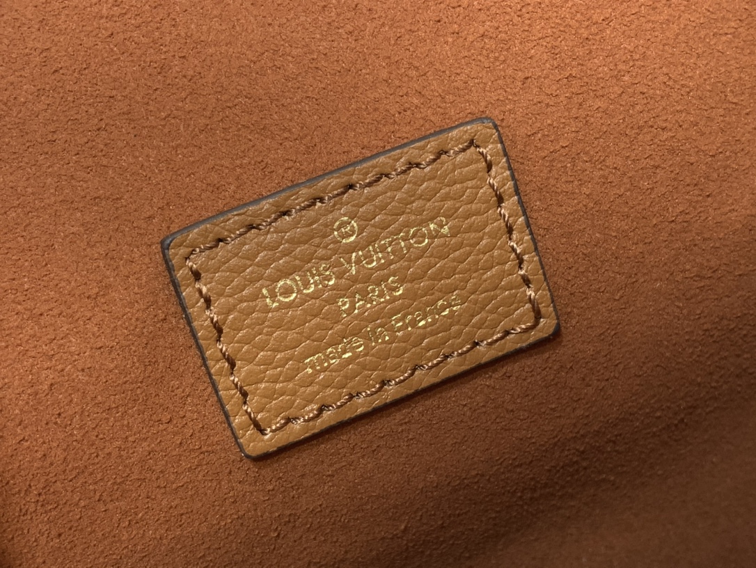 Pochette Métis Monogram Empreinte Leather Cognac M12711