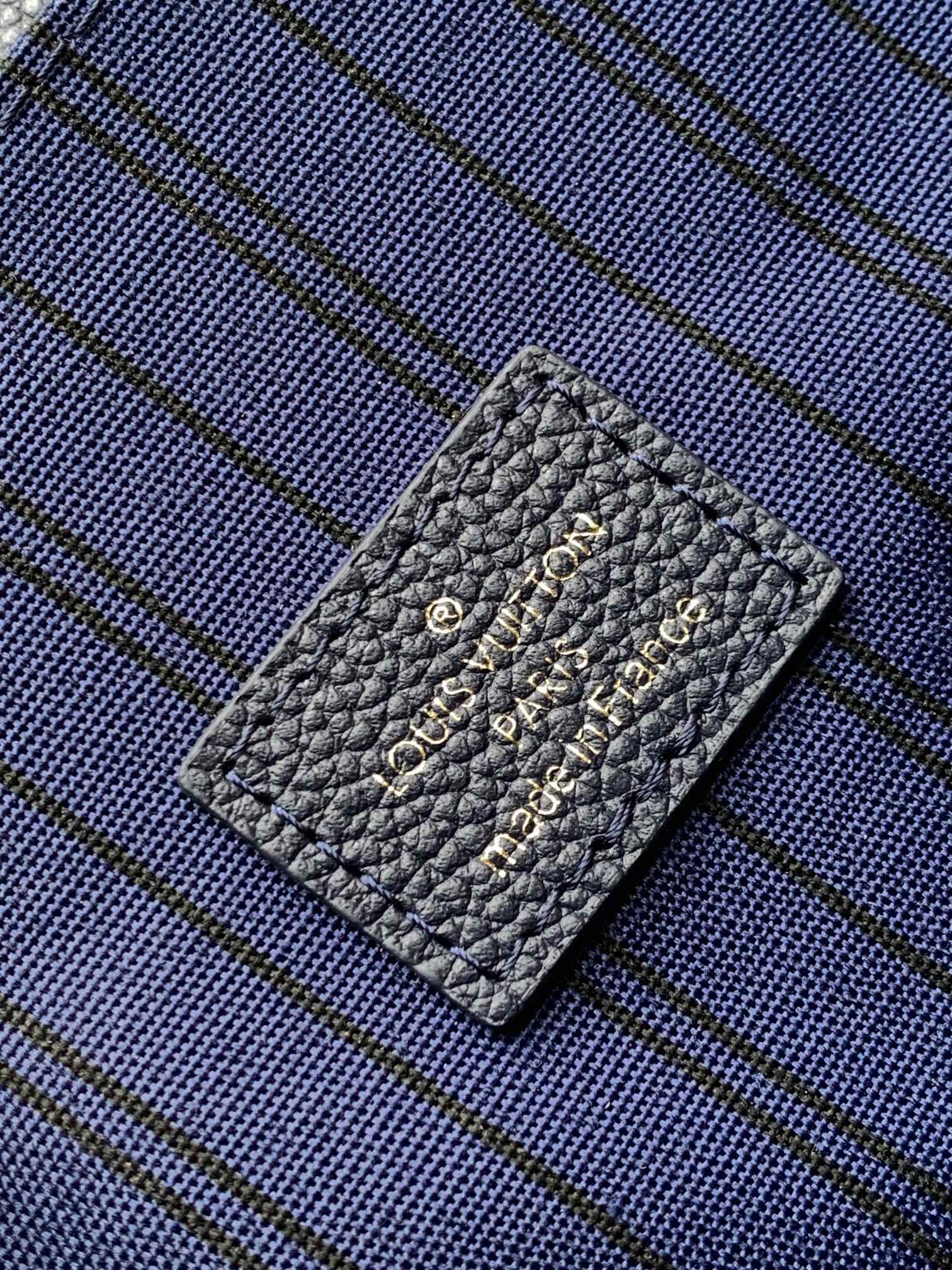 Pochette Métis Monogram Empreinte Leather Navy M44881