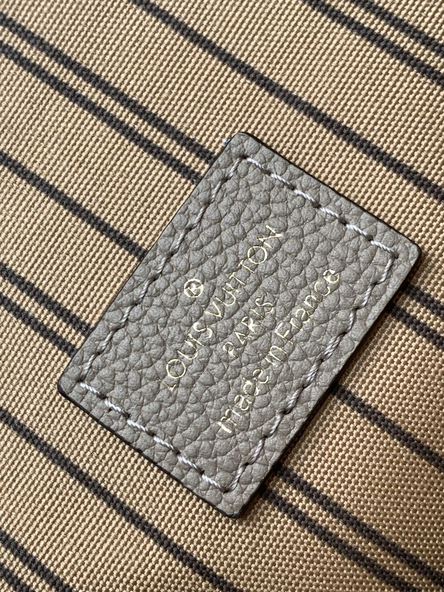 Pochette Métis Monogram Empreinte Leather Turtledove M44881