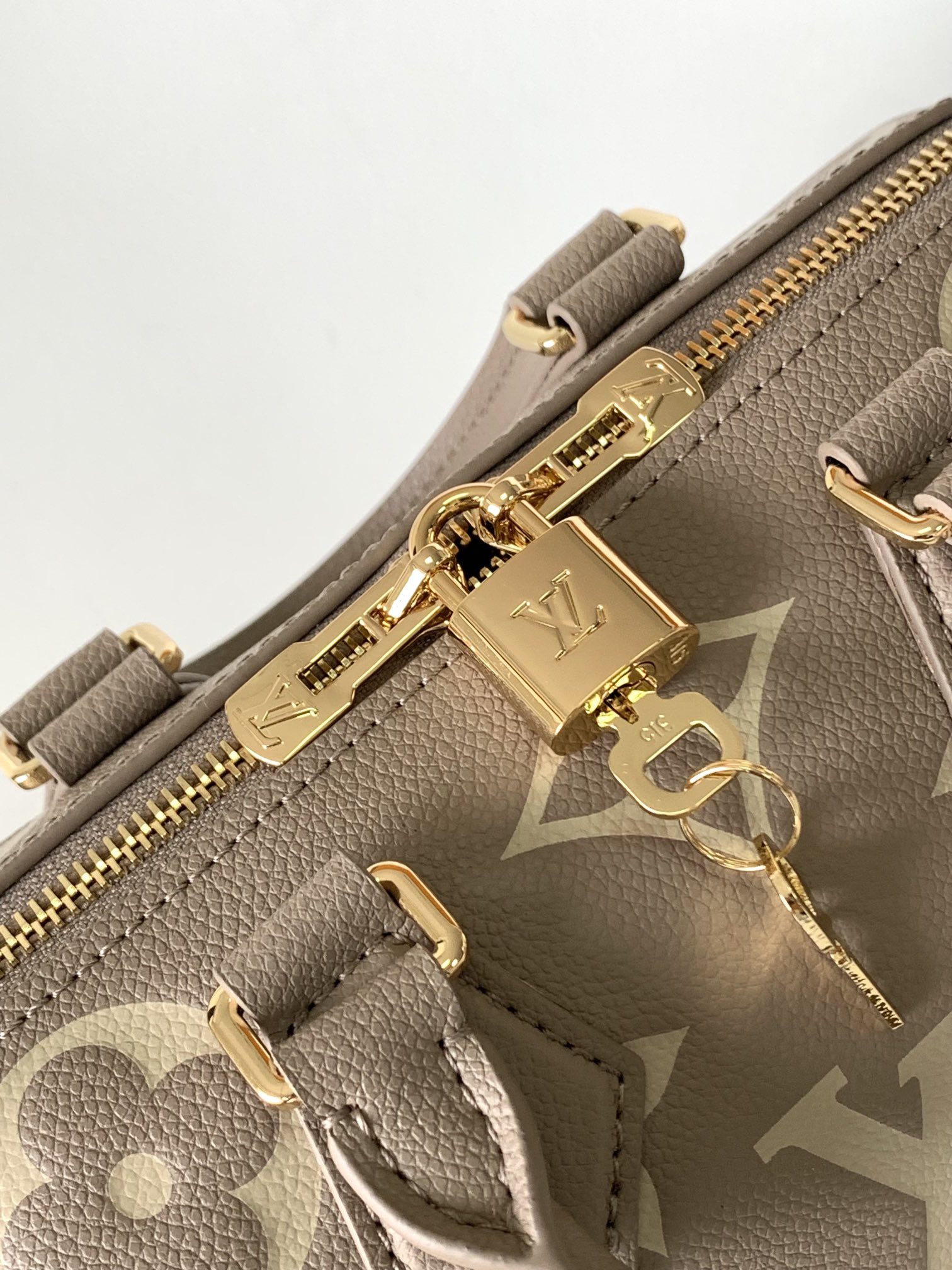 Speedy Bandoulière 20 Monogram Empreinte Leather Bicolor Tourterelle Gray / Crème Beige M46575