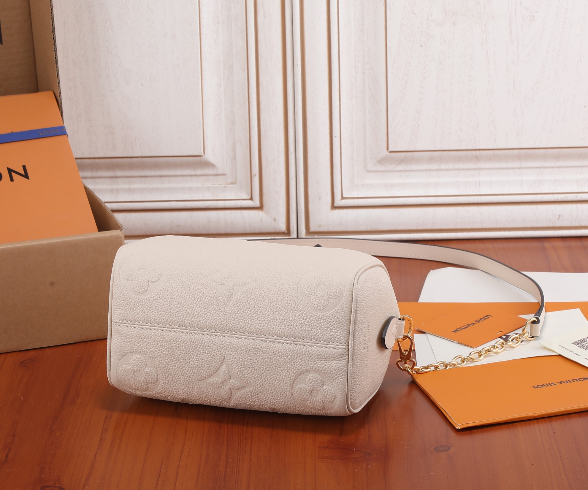 Speedy Bandoulière 20 Monogram Empreinte Leather Crème Beige M58954