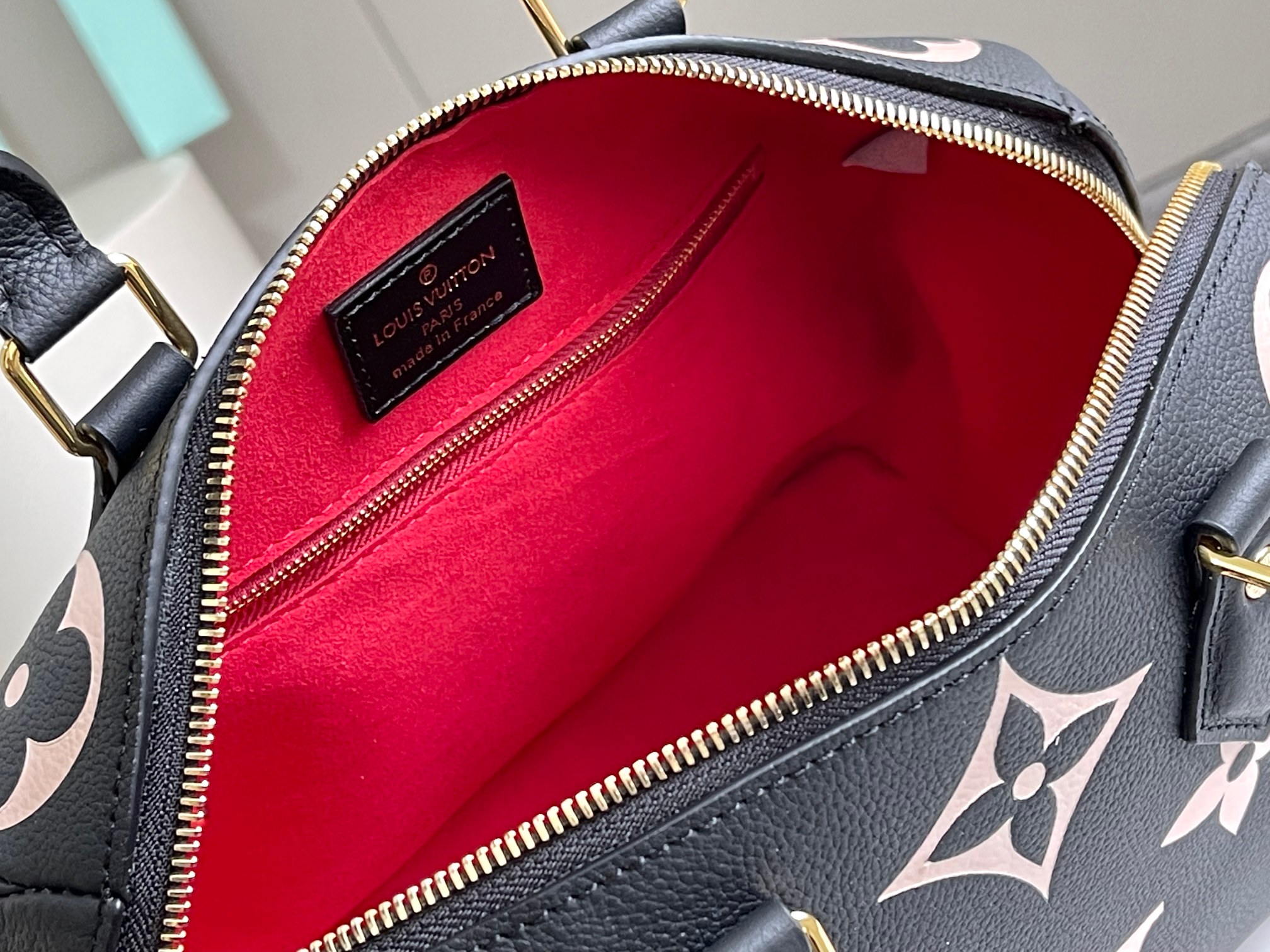 Speedy Bandoulière 25 Bicolor Monogram Empreinte Leather M58947