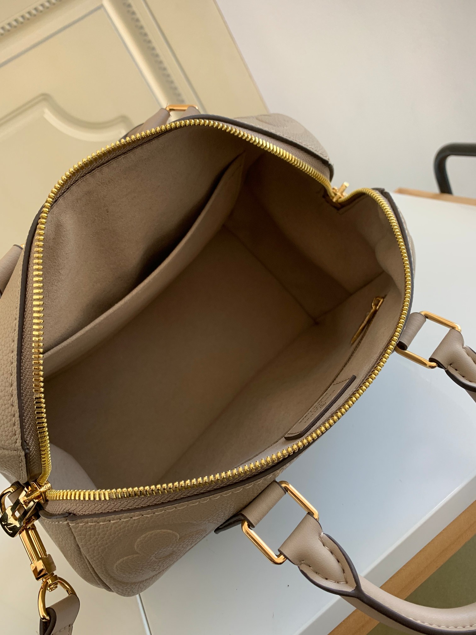 Speedy Bandoulière 25 Monogram Empreinte Leather Turtledove M59273